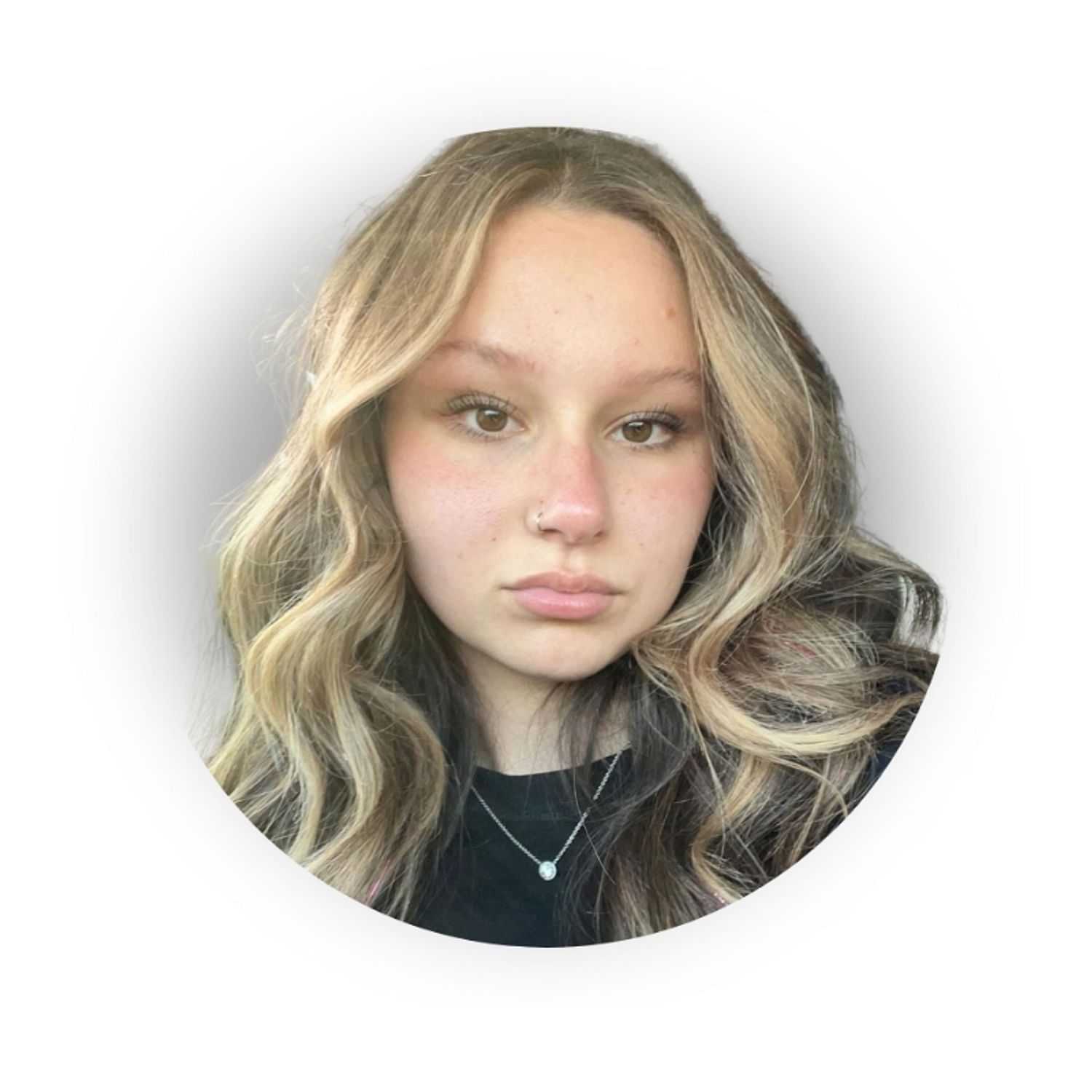 Portrait of Mallory, a professional stylist at Changes Salon, showcasing their expertise and style.